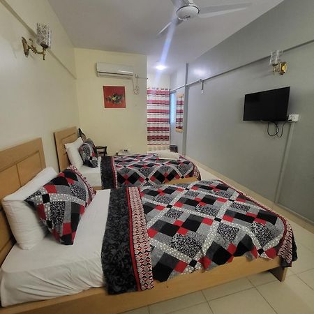 Hotel Rooms Dha Karachi Bagian luar foto