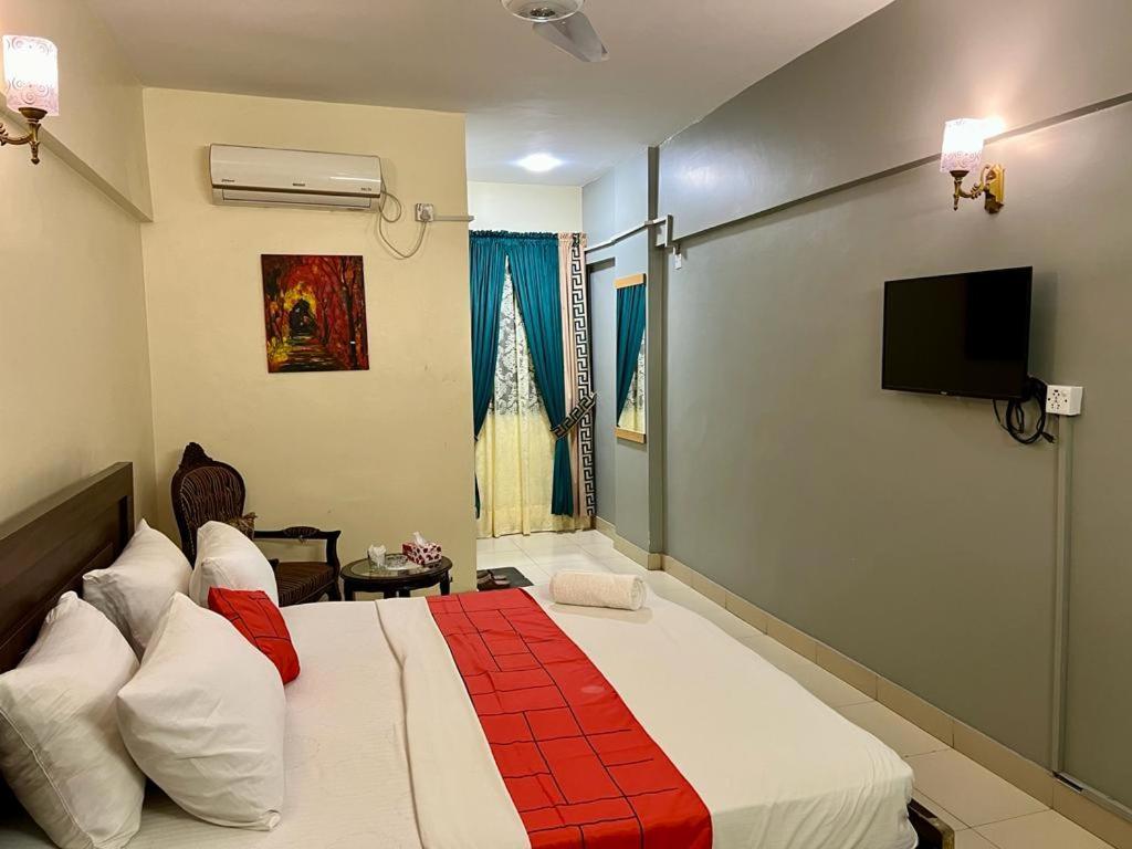 Hotel Rooms Dha Karachi Bagian luar foto