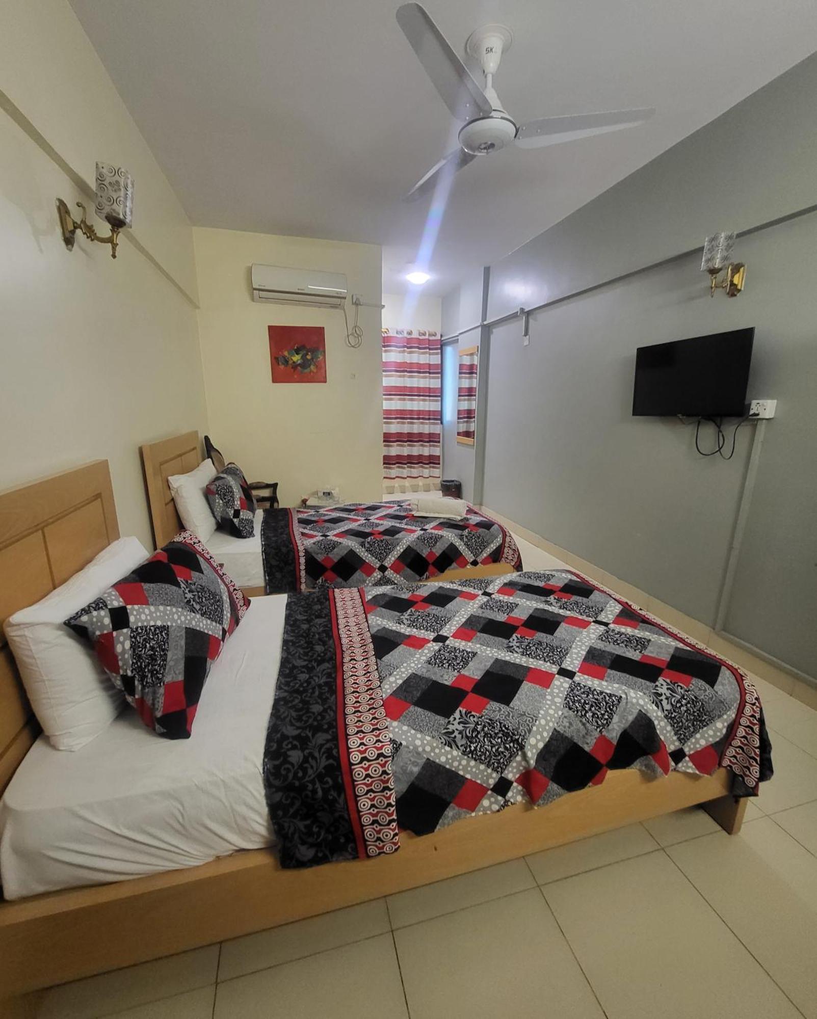 Hotel Rooms Dha Karachi Bagian luar foto
