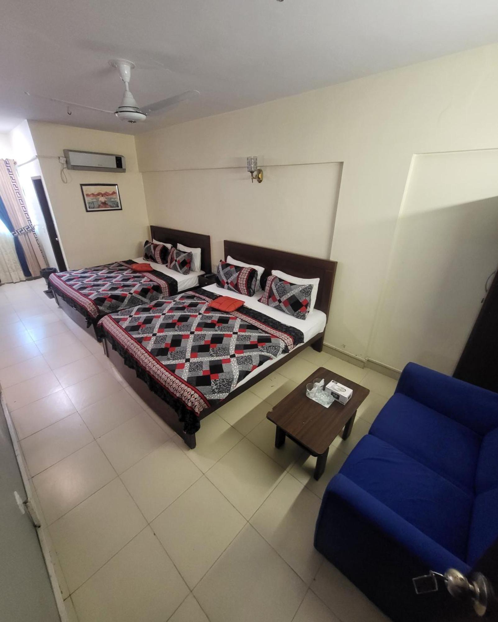 Hotel Rooms Dha Karachi Bagian luar foto