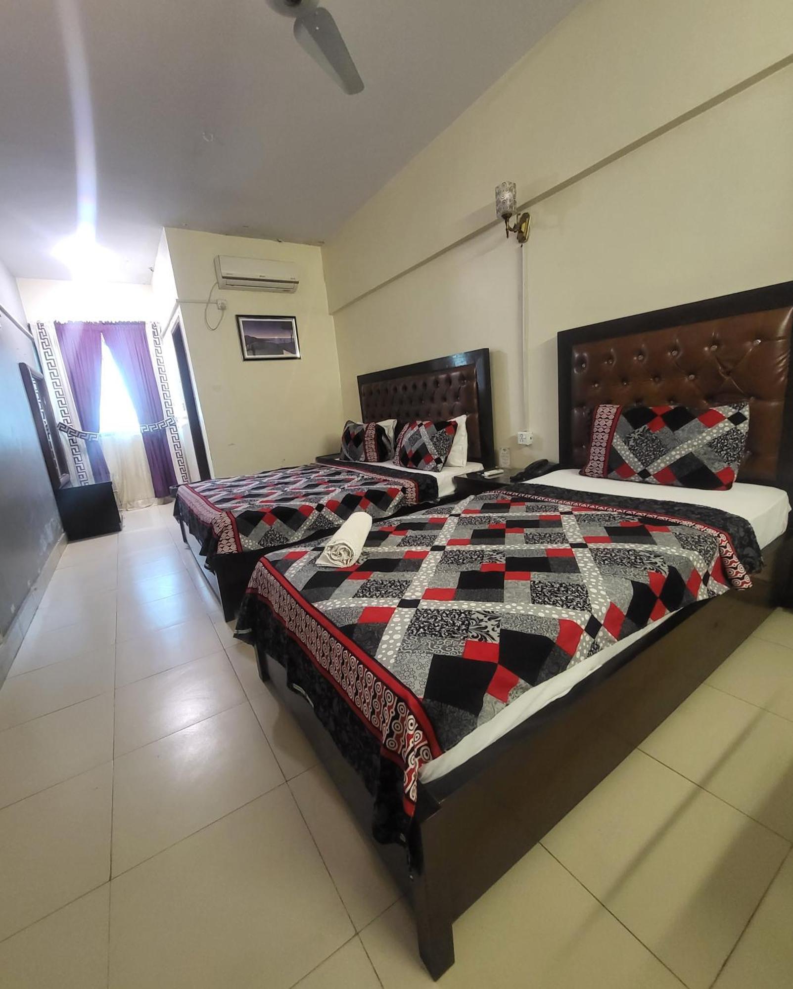 Hotel Rooms Dha Karachi Bagian luar foto
